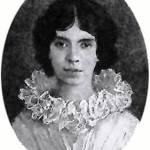 Why would Emily Dickinson be called “The woman in white”?